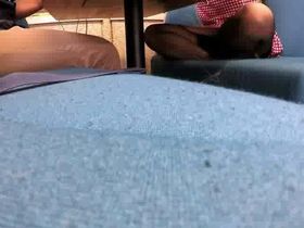 Парень в кафе снимает под столом ножки тёлки в чёрных чулках